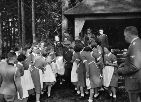 Adolf Hitler meets a group of Arbeitsmaiden (RAD worker girls) in FührerhauptquartierTannenberg